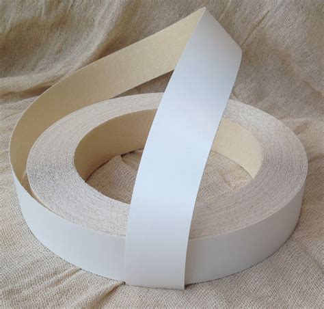 12 inch by 99 inch pre-glued Oak Melamine Veneer Sheet. . White melamine edge tape